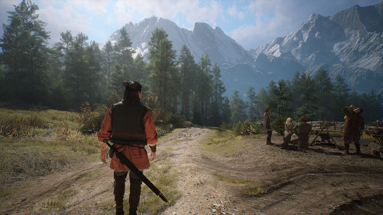 Coen walking a daylight road through the valley in official footage
